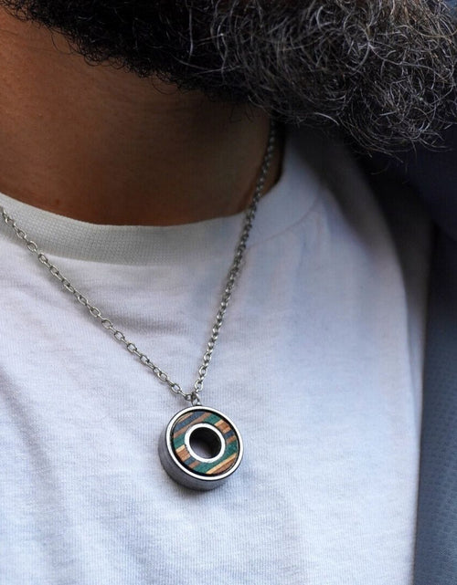 Load image into Gallery viewer, Upcycled Skateboard Bearing Pendant Necklace
