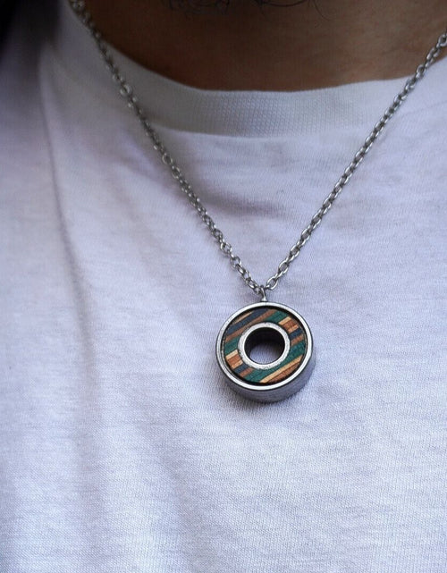 Load image into Gallery viewer, Upcycled Skateboard Bearing Pendant Necklace
