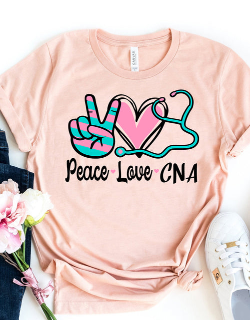 Load image into Gallery viewer, Peace Love CNA T-shirt
